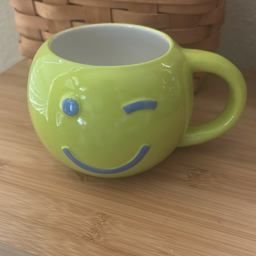Green winky face cup